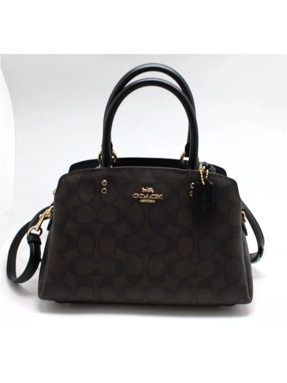 Coach Brown and Black Signature mini Lillie bag. Monogram purse, Great condition